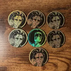 Lot Of 7 Larry + Erika Pokemon Coins - Image 1