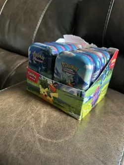 Pokemon Trading Card Game Collectible Tins Pikachu with their bulk cards. - Image 2