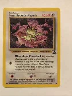 Team Rocket's Meowth Black Star Promo Pokemon Card #18 - Image 1