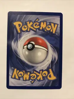 Team Rocket's Meowth Black Star Promo Pokemon Card #18 - Image 2