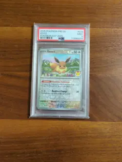 2025 POKEMON PRE EN-PRISMATIC EVOLUTIONS POKEMON DAY 2025 #074 EEVEE PSA 9 - Image 1