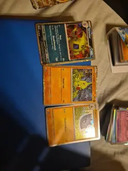 Pokemon PAL 110/193 Larvitar, 111/193 Pupitar, Tyranitar 135/193 Cosmos Holos - Image 1