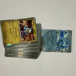 50 Assorted Holos + Reverse Pokemon Cards including 1 EX card - No Energy Bulk - Image 1