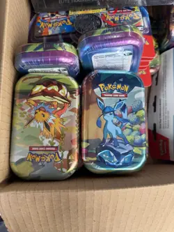 Pokemon Prismatic Evolutions sealed mini tin - Image 1