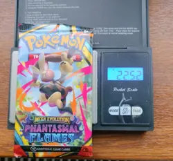 Pokemon Tcg Mega Evolution phantasmal flames Heavy 22.52g Booster Pack Sealed - Image 1