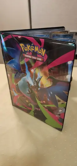 Near complete set Phantasmal Flames Pokemon Cards in Folder - Image 1