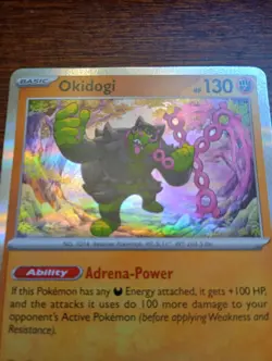 Okidogi (Master Ball Pattern) 057/131 Sv: Prismatic Evolutions Holo pokemon card - Image 2