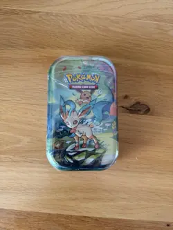 Pokemon TCG Scarlet & Violet Prismatic Evolutions Boosters Mini Tin Leafeon - Image 1