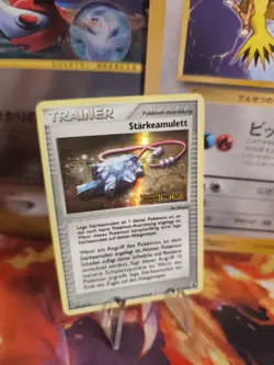 Pokemon Card Starkeamulett Strength Charm Reverse Stamp Holo NM Dragon Frontiers - Image 1