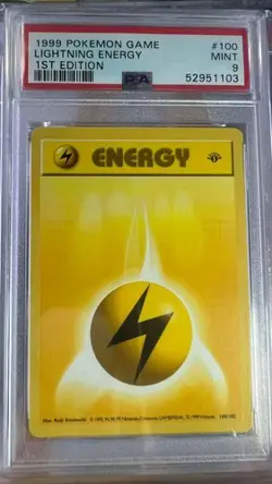 Lightning Energy 100/102 1st Edition Game Pokemon PSA 9 - Image 1