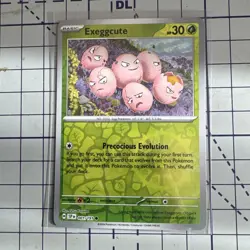 Exeggcute Pokemon TCG Surging Sparks Card 001 Reverse Holo Common Basic - Image 1