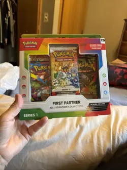 Pokemon TCG First Partner Illustration Collection Series 1 Box Charmander Rowlet - Image 1