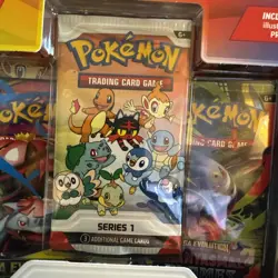 Pokemon TCG First Partner Illustration Collection Series 1 Box Charmander Rowlet - Image 2