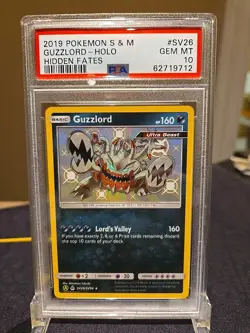 2019 POKEMON SUN & MOON HIDDEN FATES #SV26 GUZZLORD-HOLO PSA 10 - Image 1