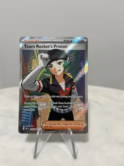 Pokemon TCG Team Rocket’s Proton 227/182 Full Art Trainer Destined Rivals - Image 1