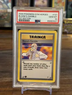 Pokemon PSA10 Blaine’s Gamble 1st Edition Gym Heroes 121/132 POP60 Gem MINT - Image 1