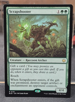 R 0191 Scrapshooter Bloomburrow MTG Card Rare Near Mint Green Raccoon Archer NM - Image 1