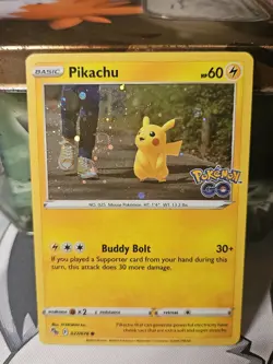 Pokemon Pikachu - (Cosmos Holo SWIRL) 027/078 Pokemon GO Promo NM - Image 1