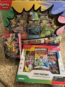 POKEMON TCG FIRST PARTNER ILLUSTRATION, DELUXE PIN & ASCEND HEROES BOOSTER BOX - Image 1