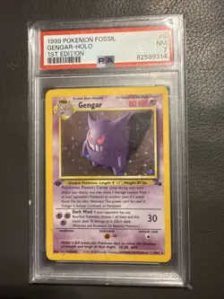1999 POKEMON FOSSIL 1ST EDITION #5 GENGAR HOLO PSA 7 - Image 1