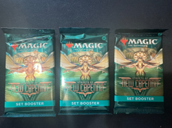Lot of 3 Magic: The Gathering Streets of New Capenna Set Booster Packs - Image 1