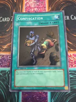 Yugioh Confiscation MRL-038 Super Rare 1st Edition Moderately Played - Image 1