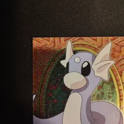 Dratini Topps Pokemon #147 - E10 of 12 - Textured Holo - Black Logo - Image 4