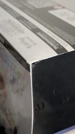 ripped Pokemon TCG Prismatic Evolutions Center Exclusive Elite Trainer Box - Image 3