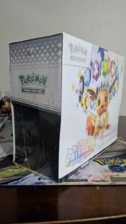 ripped Pokemon TCG Prismatic Evolutions Center Exclusive Elite Trainer Box - Image 4