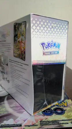ripped Pokemon TCG Prismatic Evolutions Center Exclusive Elite Trainer Box - Image 5