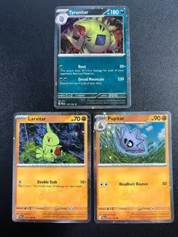 Pokemon PAL 110/193 Larvitar, 111/193 Pupitar, Tyranitar 135/193 Cosmos Holos - Image 1