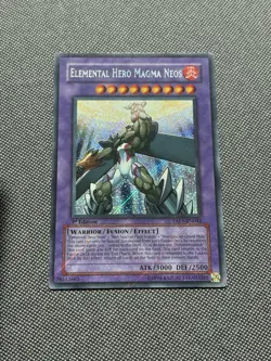 Yugioh Elemental Hero Magma Neos TAEV-EN043 Secret Rare 1st Ed HOLO BLEED - Image 1