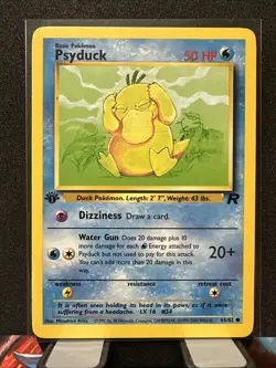 Psyduck 1st First Edition 65/82 Pokemon Card 2000 Team Rocket LP - Image 1