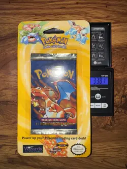 1999 POKEMON FACTORY SEALED SHADOWLESS BLISTER BOOSTER PACK CHARIZARD ART 33.88g - Image 1
