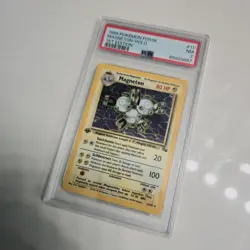 1999 POKEMON FOSSIL #11 MAGNETON-HOLO 1ST EDITION PSA 7 - Image 1