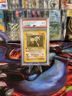 Pokemon TCG Hitmonlee 1st Edition Holo Rare Card Fossil 7/62 PSA 8 - Image 1