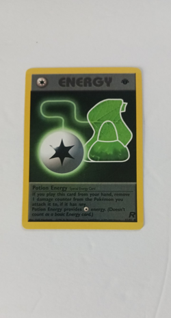 Team Rocket First Edition Potion Energy Vintage Pokemon Card NM Condition - Image 5