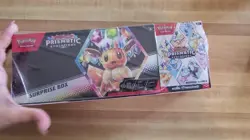 Pokemon Prismatic Evolutions Sam’s Club Exclusive Surprise Box + Booster Bundle - Image 2