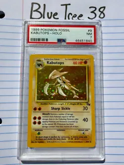 1999 POKEMON FOSSIL HOLO KABUTOPS #9 PSA 7 - Image 1