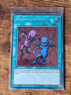 Delinquent Duo LCKC-EN101 Secret Rare 1st Edition (NM+) TCG Yugioh - Image 1