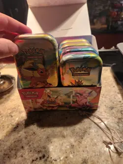 Prismatic Evolutions Tins Empty With Box Coins And Special Non Tcg Card - Image 1