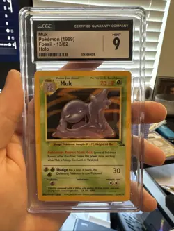 CGC 9 MINT 1999 Pokemon Fossil Unlimited #13 Muk Holo - Image 1