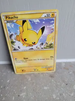 Pokemon TCG Pikachu 61/90 Undaunted Regular Card - Image 1