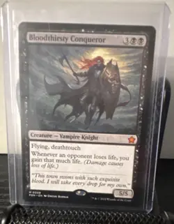 Wizards of the Coast Bloodthirsty Conqueror Foundations #58 Mythic Regular - Image 1