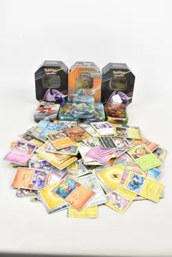 Pokemon TCG Mixed Card Lot Multiple Tins Unchecked - Image 1