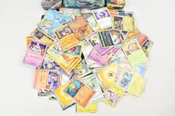 Pokemon TCG Mixed Card Lot Multiple Tins Unchecked - Image 2