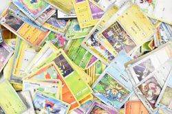 Pokemon TCG Mixed Card Lot Multiple Tins Unchecked - Image 3