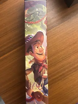 Wilds Unknown Disney Lorcana TCG Woody Foil Playmat Non-Slip 24x13.5" - Image 1