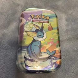 Pokemon TCG - Prismatic Evolutions Mini Tin (Vaporeon) Factory Sealed - Image 1