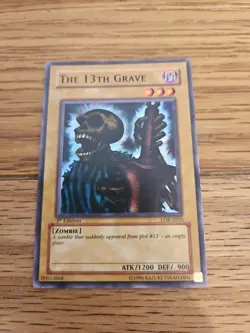 The 13th Grave LOB-E010 Common 1st Edition Near Mint Yugioh - Image 1